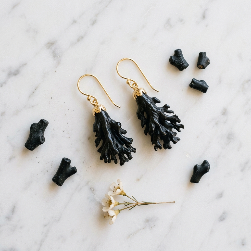 Boucle d’oreille en corail noir : comment choisir le bon bijou ? - illustration